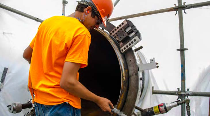 A field machinist makes preparations to ensure a reliable weld on the pipes for a natural gas processing and compressor station. Tri Tool’s attention to quality and safety enabled Sauer Group to perform excellent welds at a rapid pace, meeting the project’s schedule constraints.