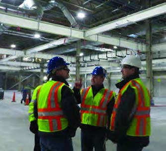 On most days, up to 40 different contractors from various trades are on site at the massive plant, competing for workspace. Constant contact with F.W. Webb ensures that Mollenberg-Betz has adequate inventory and support to stay on track. Pictured from left to right, Kevin Buchanan of GF, Mollenberg-Betz Project Manager Jamie DeWald, and Ryan Warner of GF consult at the SolarCity jobsite.